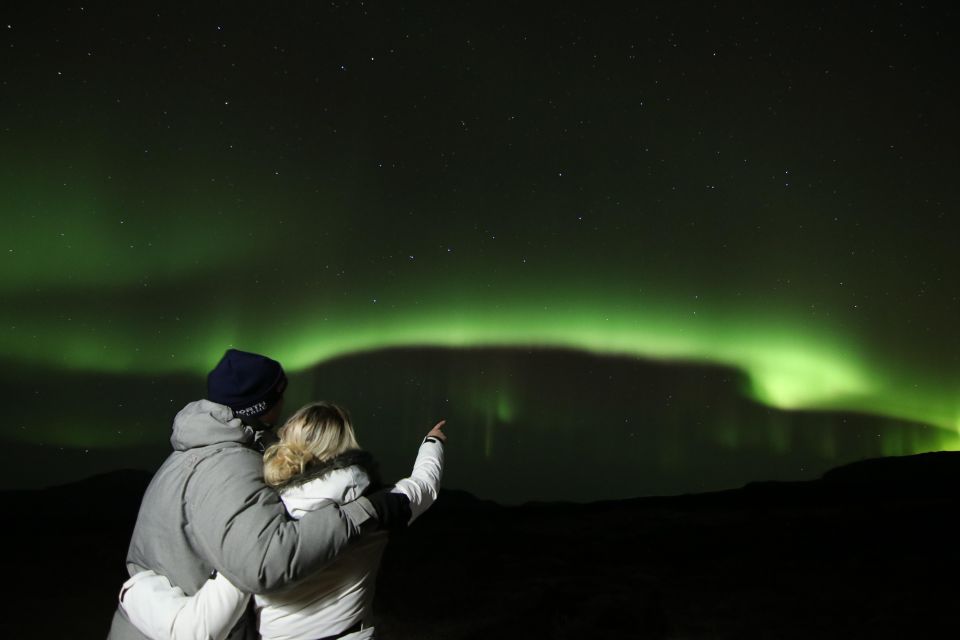 From Reykjavík: Northern Lights Tour with Hot Cocoa & Photos - How aurora hunting works: forecasts, cloud cover, and darker roads